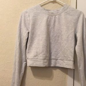 Cropped long sleeve sweater